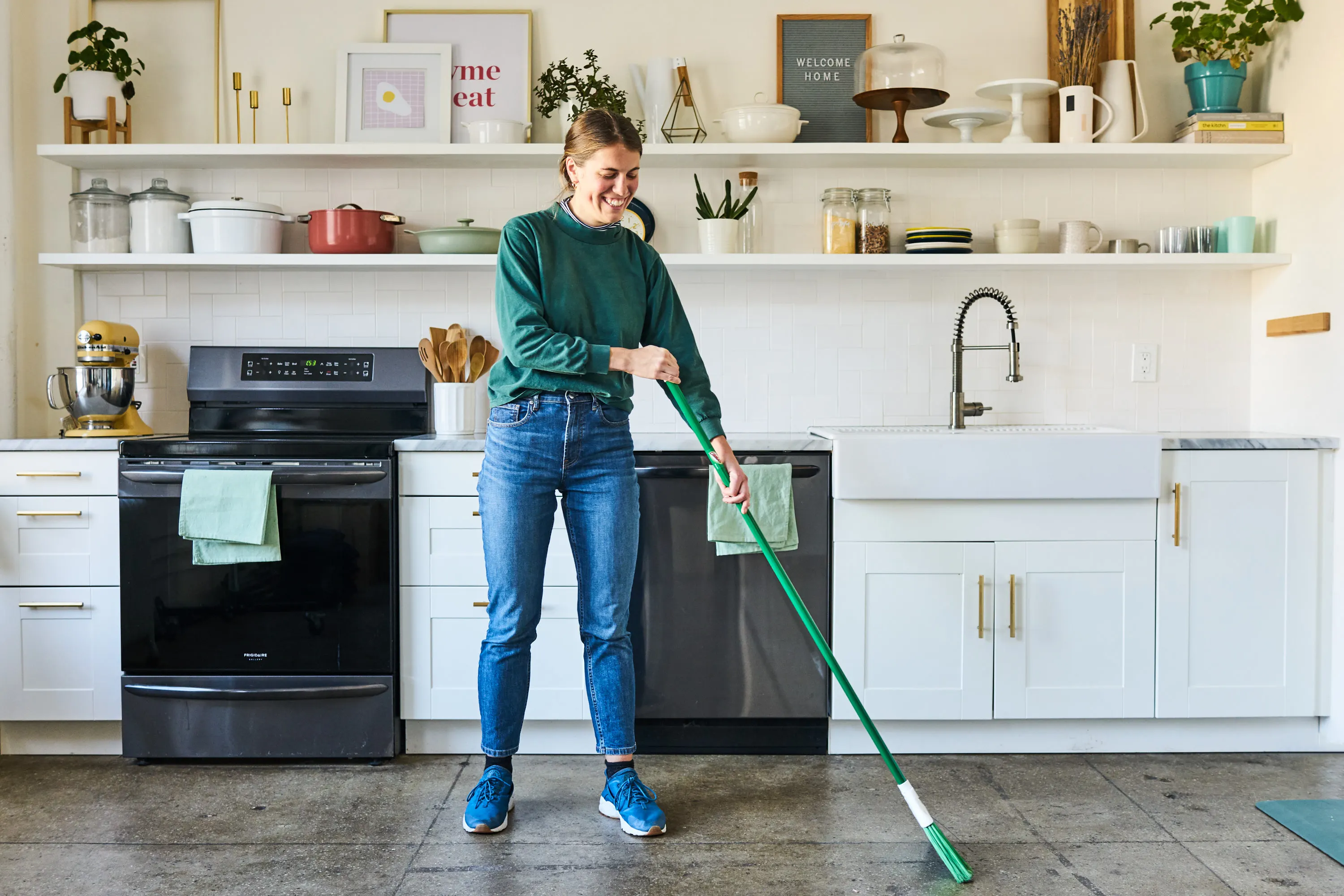 Professional cleaner with cleaning supplies